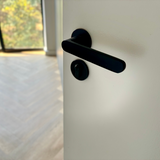 Matt black Modern Lever Handle on Round Rose